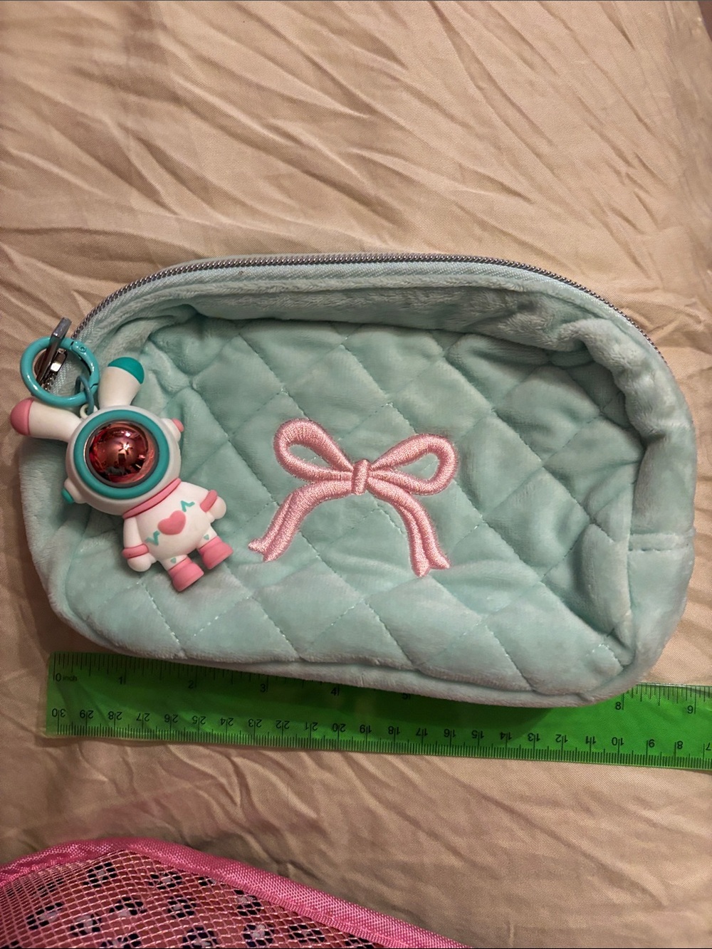 Makeup bag with charm